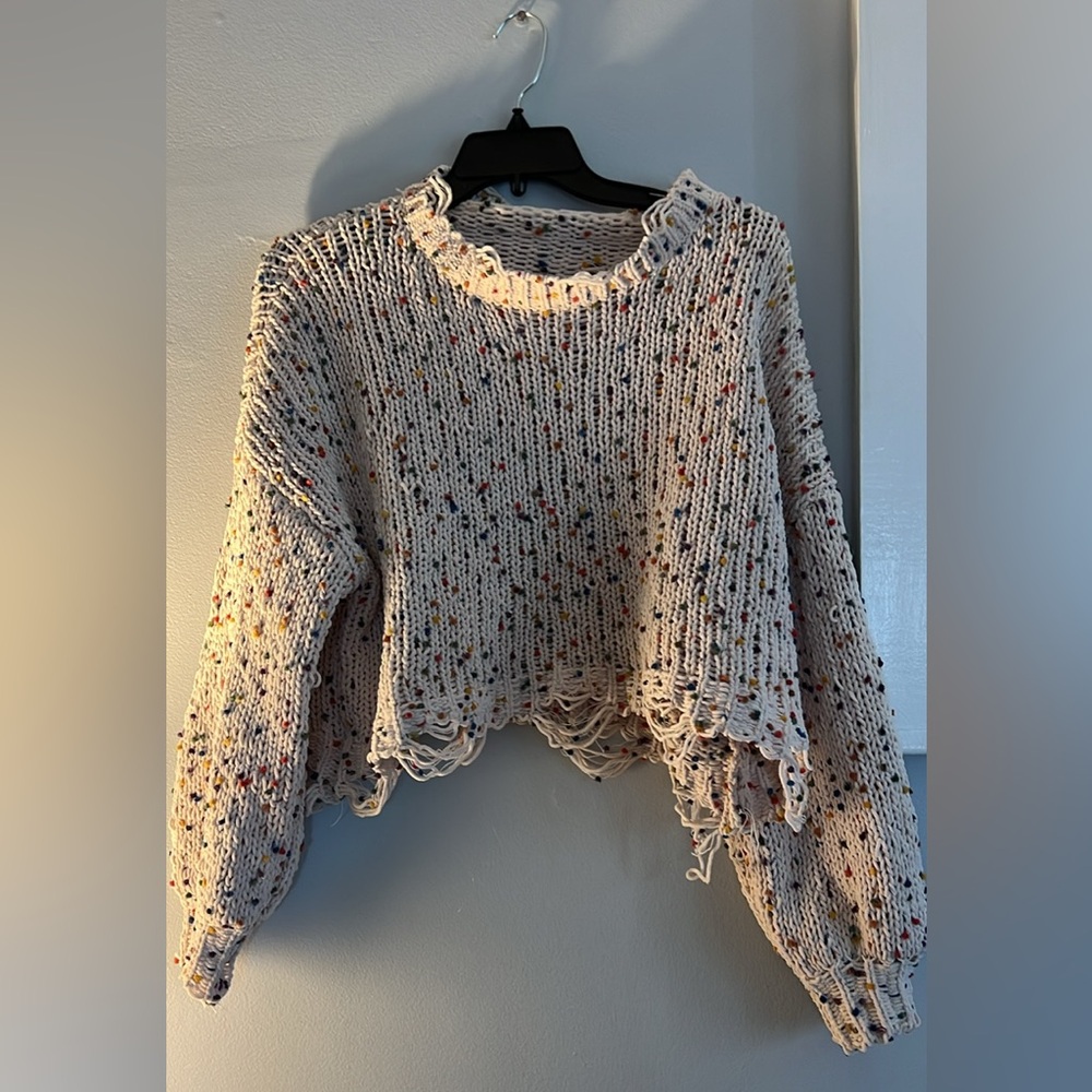 Distressed cropped sweater